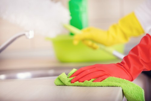 Cleaning team handling dust and debris after renovation work